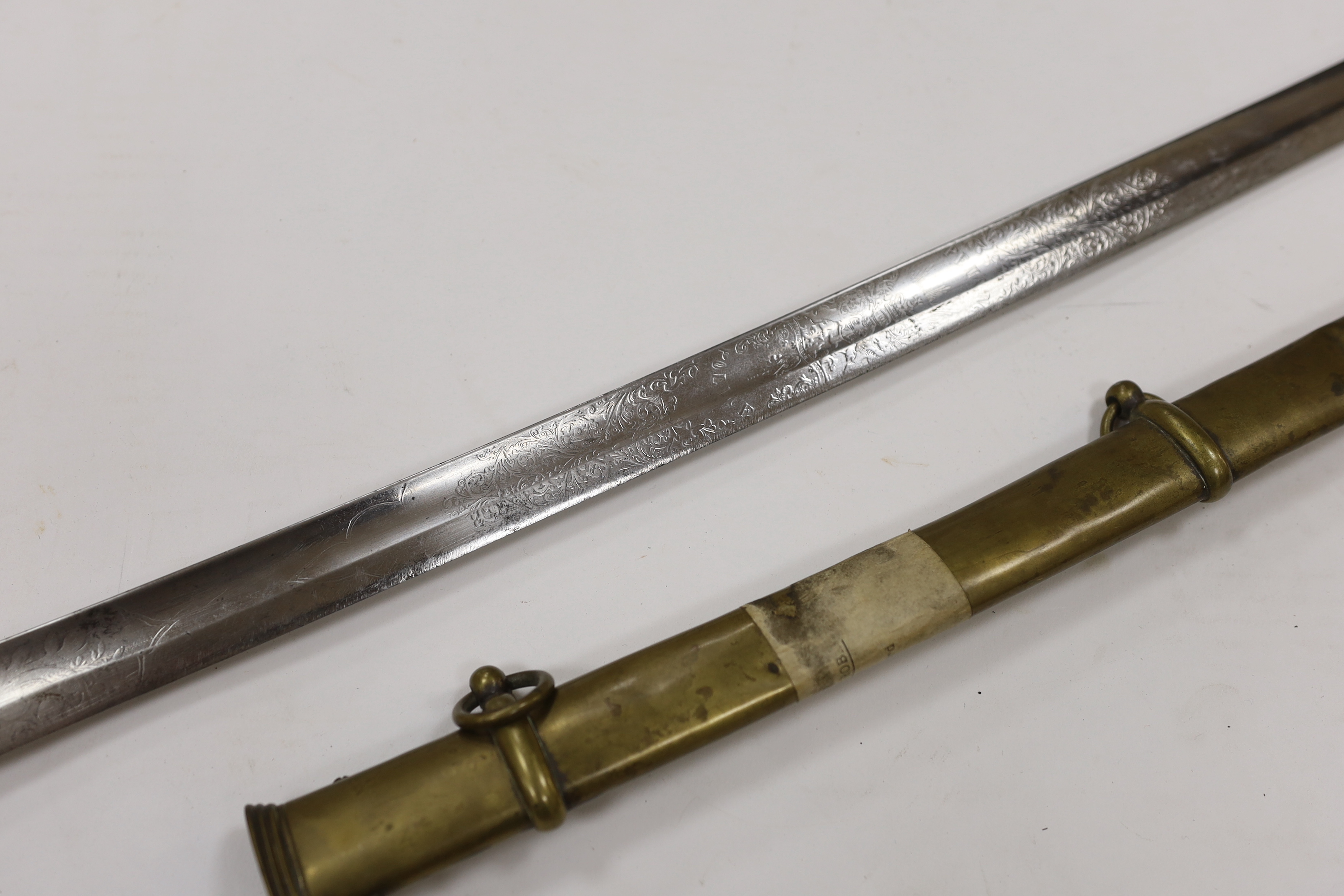 A scarce 1845 pattern infantry officer’s sword to the Penang Police, with regulation hilt, incomplete in its brass scabbard, blade 82cm